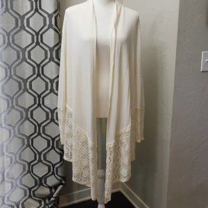 It's all about the lace! Beautiful open front lace detailed Cardigan